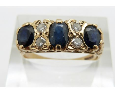 A 9ct gold ring set with three oval sapphires and diamonds, 3.5g, size R