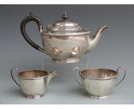 George VI hallmarked silver three piece tea set, Sheffield 1938, maker Harrison Brothers &amp; Howson, length of teapot 26cm,