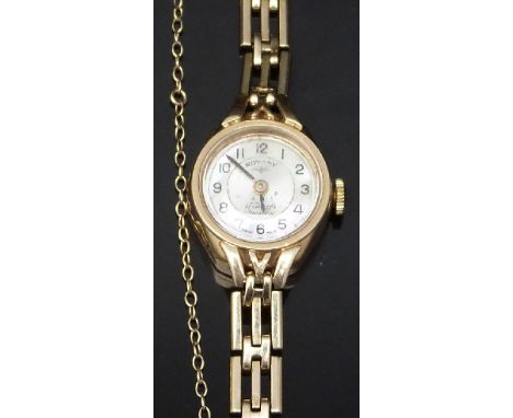 Rotary 9ct gold ladies wristwatch with black hands and Arabic numerals, two-tone silver and cream dial and signed 17 jewel mo