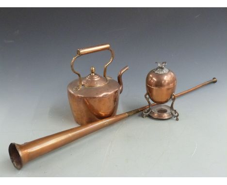 A coaching horn, copper teapot and copper burner/egg codler