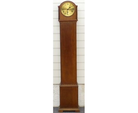 An oak cased granddaughter clock with three train movement and with bobbin turned decoration, the case 148cm tall