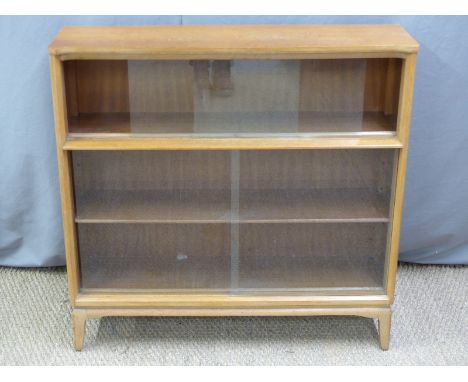 Gordon Russell or similar light oak bookcase with glazed sliding doors, W93 x D24 x H95cm