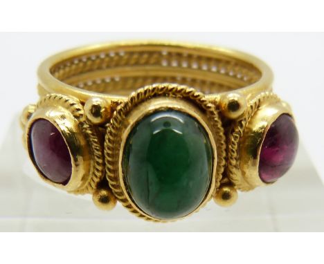 Ilias Lalaounis 18ct gold ring set with an emerald cabochon and two ruby cabochons, originally purchased in New York, 9.2g, s