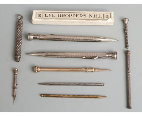 Nine propelling and other pencils and tools to include Mordan, yellow metal Victorian example with agate top, two Dunhill exa