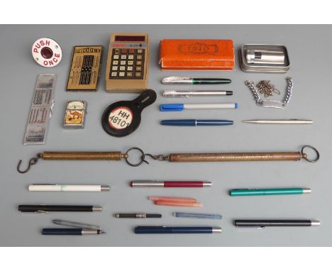 "Push Once" bus button, mainly Parker pens, vintage pocket calculators including APF Mark III, World Star mouth organ, lighte