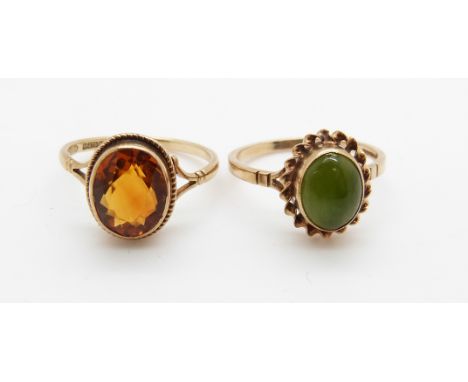 A 9ct gold ring set with citrine and a 9ct gold ring set with a jade cabochon, 3.9g
