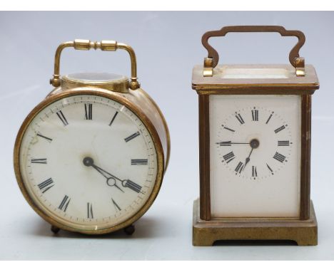 20thC French brass carriage clock with Roman enamelled dial and keyless movement, 10.5cm tall together with a circular brass 