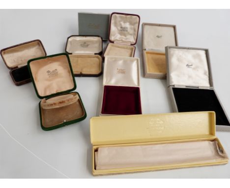 A collection of boxes including a Charles L. Reis &amp; Co, Dublin bangle box, Beards Cheltenham, watch box, Waite &amp; Son 
