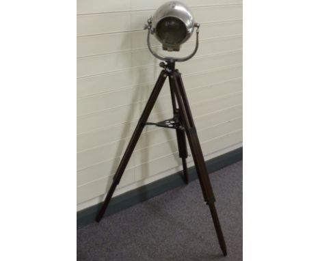 Vintage polished Strand Electric aluminuim theatre or similar lamp on tripod, H120cm