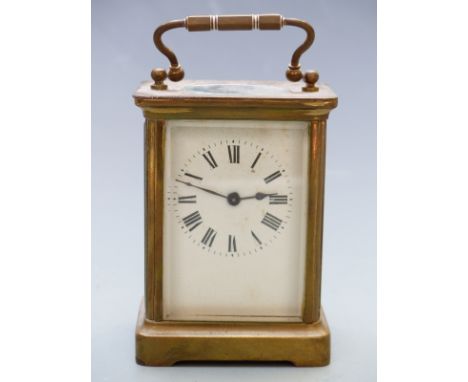 20thC French brass carriage clock with Roman enamelled dial, blued steel hands and corniche style case, 10.5cm tall