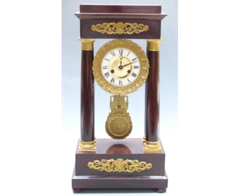 French striking 'Four Pillar' mantel clock circa mid 19thC with mahogany case with gilt decorations, Roman chapter ring and B