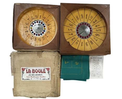 A vintage wooden 'La Boule' game in box, with one other