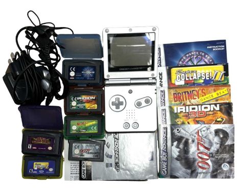 A Nintendo Gameboy Advance SP, together with a collection of games, manual, power supply and headset