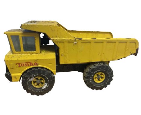 A vintage pressed steel Tonka dump truck