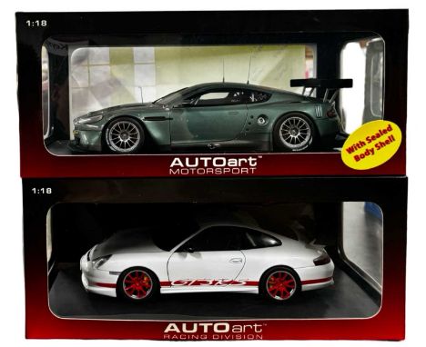 A pair of boxed AutoArt 1:18 scale die-cast cars, to include: - Porsche 911 (996) GT3 RS - Aston Martin DBR9