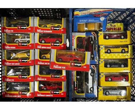 A mixed lot of boxed die-cast cars, to include Bburago, Maisto etc
