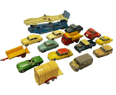 A collection of various die-cast Corgi vehicles