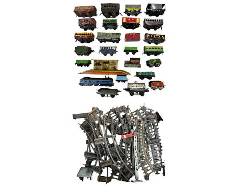 A collection of vintage 0 gauge tinplate rolling stock, to include Hornby and Wells Brimtoy