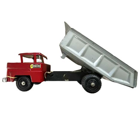 A vintage pressed steel hydraulic dump-truck by Marx
