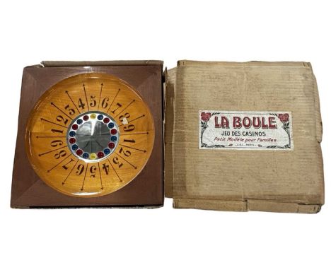 A vintage boxed 'La Boule' table top game