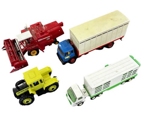 Four large vehicles, to include: - Britains Combine Harvester - Britains Tractor - Tonka poultry Van - Britains l ivestock tr
