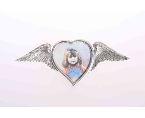 A LATE VICTORIAN SILVER PHOTOGRAPH FRAME, maker **over LW, London 1896, the heart shaped frame flanked by wings, easel back, 