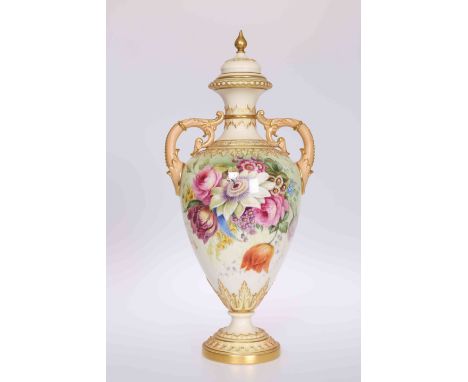 A ROYAL WORCESTER FLORAL DECORATED TWO-HANDLED VASE AND COVER, CIRCA 1905, the ovoid body painted with an exuberant floral bo