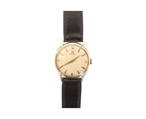 AN OMEGA GOLD PLATED WRISTWATCH, circular dial with centre sweep seconds, in an Omega box. 32mm wide