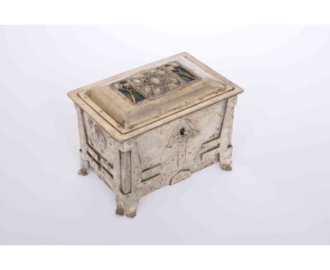 A WHITE METAL AND ENAMEL CASKET IN LIBERTY STYLE, the hinged caddied cover with enamel backed pierced foliate panels flanking