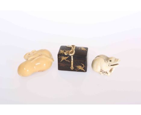 A JAPANESE LACQUER AND IVORY NETSUKE, in the form of a box with lift-off cover, gilded with cranes, the rope of carved ivory,