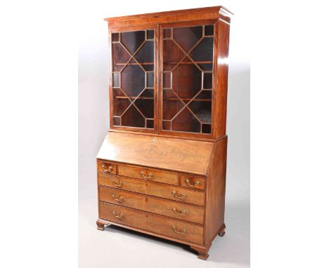 A GEORGE III MAHOGANY BUREAU BOOKCASE, the upper section with a pair of astragal glazed doors, the base with crossbanded fall