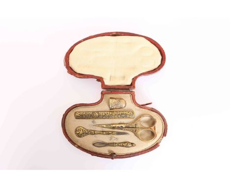 A 19TH CENTURY ETUI, comprising gold damascened needle case, leather point, loop threader, each test as 22 carat gold decorat
