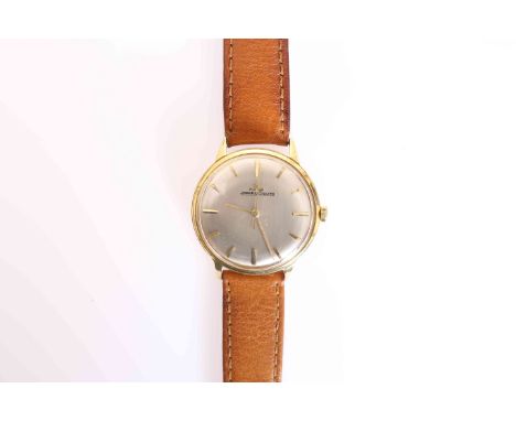 A JAEGER-LECOULTRE 18 CARAT GOLD WRIST WATCH, the circular dial with centre sweep seconds and baton markers, cal. 880, case b