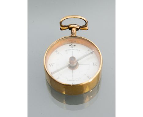EARLY NINETEENTH CENTURY GILT METAL POCKET COMPASS
Thomas Rubergall of London, with hinged shaft suspension loop and white in
