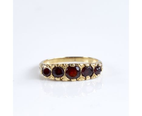 An early 20th century 18ct gold graduated 5-stone garnet half hoop ring, setting height 5.4mm, size L, 3.7gGood overall condi