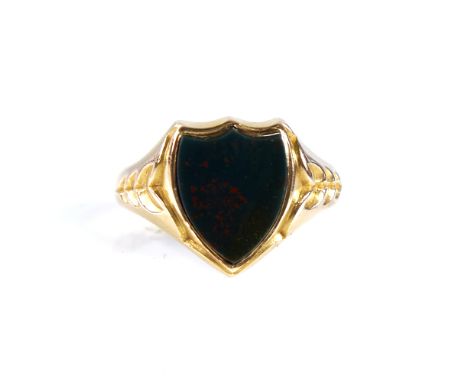 A large 19th century 15ct gold bloodstone shield seal ring, engraved leaf shoulders, hallmarks Birmingham 1874, setting heigh