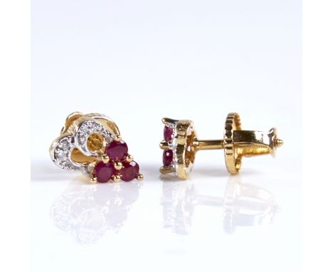 A modern pair of 18ct gold ruby and diamond stud earrings, with screw fittings, earring height 11mm, 2.5gBoth in very good or