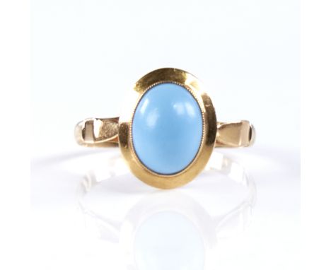 A late 20th century Egyptian high carat gold cabochon turquoise dress ring, setting height 12.9mm, size Q, 2gVery good origin