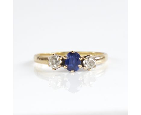 An early 20th century 18ct gold 3-stone sapphire and diamond ring, total diamond content approx 0.3ct, setting height 5.2mm, 