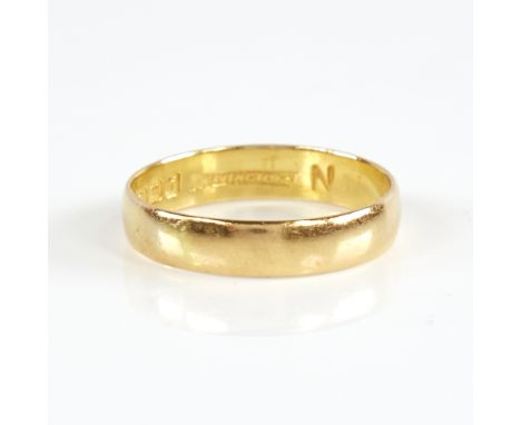 A mid-20th century 22ct gold wedding band ring, retailed by Bravingtons, hallmarks London 1964, band width 4.3mm, size Q, 3.4