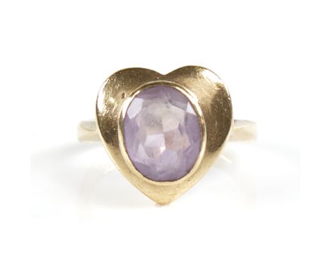 A late 20th century 9ct gold amethyst heart ring set with oval-cut amethyst, setting height 13.9mm, size K, 4gGood original c