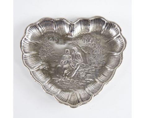 A late 19th/early 20th century German silver heart-shaped dish, Hanau, relief embossed lover decoration, import marks of Geor