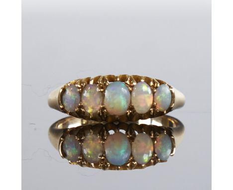 An early 20th century 18ct gold 5-stone graduated cabochon opal half hoop ring, hallmarks Birmingham 1905, setting height 6.5