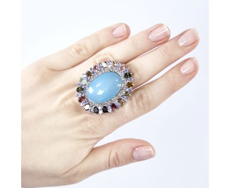 A large modern unmarked silver gem set ring, gemstones include cabochon turquoise, tourmalines and rose-cut diamonds, total d