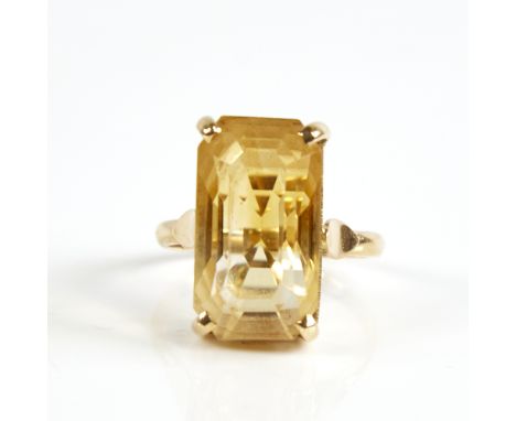 A late 20th century 14ct gold citrine dress ring, set with large emerald step-cut citrine, citrine length 18.3mm, size N, 6.3