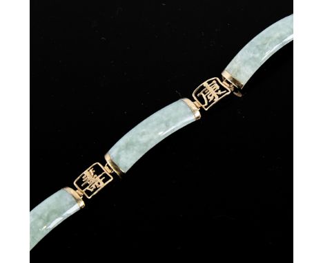 A modern Chinese 9ct gold jade bracelet, with character mark spacers, bracelet length 8cm, 11.7gGood overall condition, the c