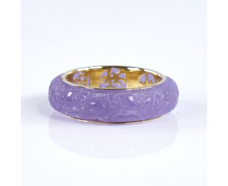 A modern Chinese 14ct gold lavender jade band ring, allover engraved decoration, band width 6.6mm, size O/P, 3.8gExcellent or