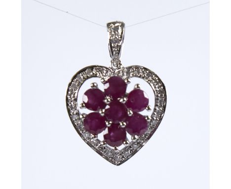 A modern 9ct white gold ruby and diamond cluster heart pendant, pendant height excluding bale 17mm, 2.5gGood original conditi