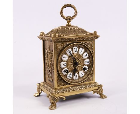An early 20th century West German brass striking bracket clock, by Franz Hermle, white enamel hour plaques with Roman numeral