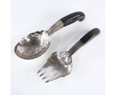 A pair of Middle Eastern unmarked silver horn-handled salad servers, pierced and engraved floral decoration with Arabic scrip